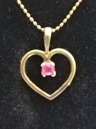 Genuine `RUBY` Heart Pendant and Chain set in 9 Carat Solid Gold.