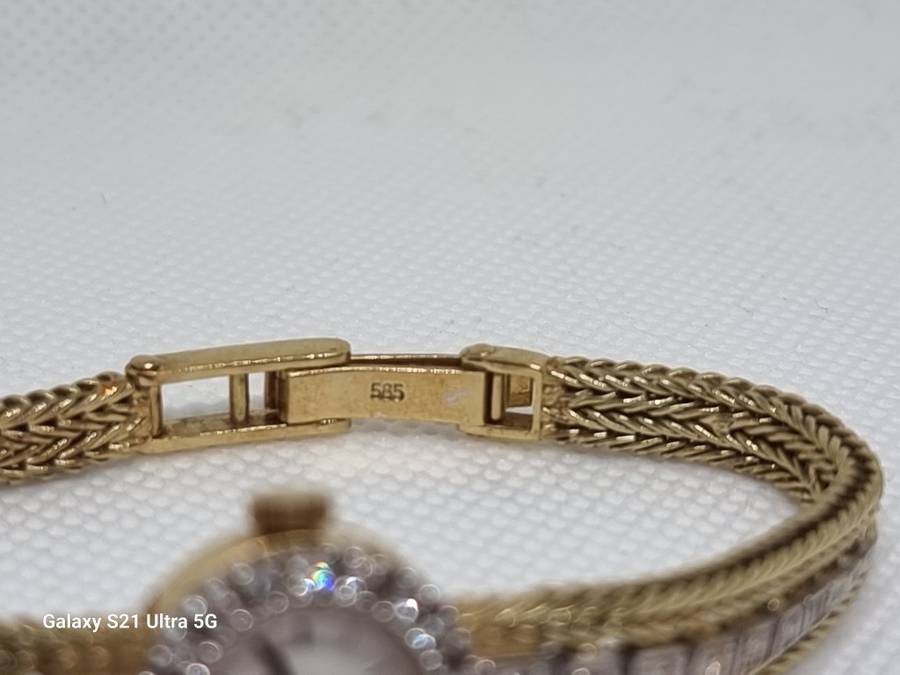 `ONE CARAT DIAMOND` Ladies Watch Set in `14CT YELLOW GOLD` .(Genuine Gold and Natural Diamonds)