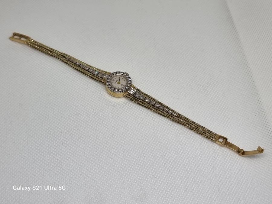 `ONE CARAT DIAMOND` Ladies Watch Set in `14CT YELLOW GOLD` .(Genuine Gold and Natural Diamonds)