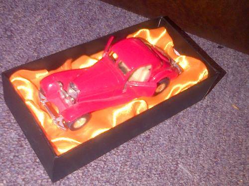 VINTAGE LIMITED EDITION RED CAR NUMBER 202.