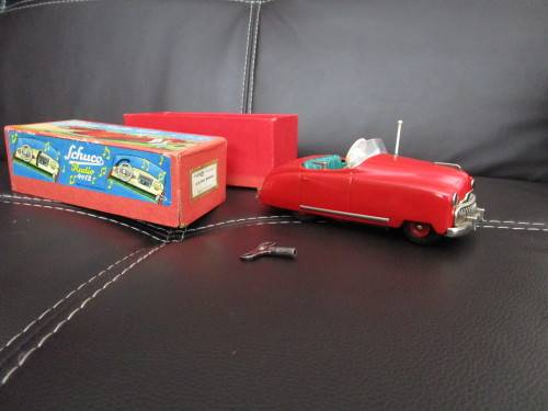 Two model cars - one Shuco Radio 4012 and one Austin model