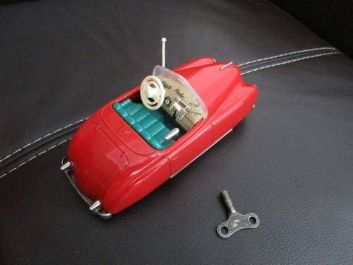 Two model cars - one Shuco Radio 4012 and one Austin model