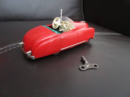 Two model cars - one Shuco Radio 4012 and one Austin model