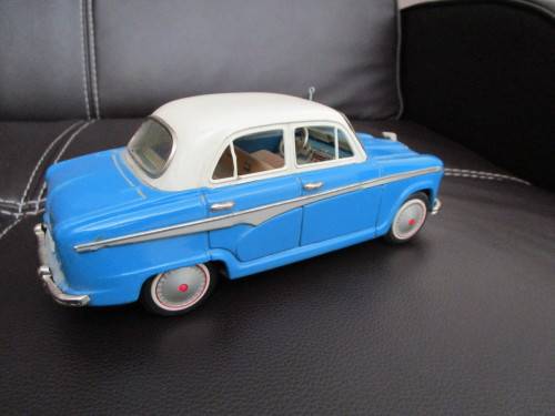 Two model cars - one Shuco Radio 4012 and one Austin model