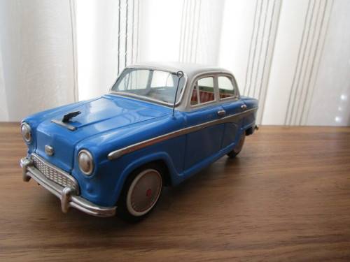 Two model cars - one Shuco Radio 4012 and one Austin model