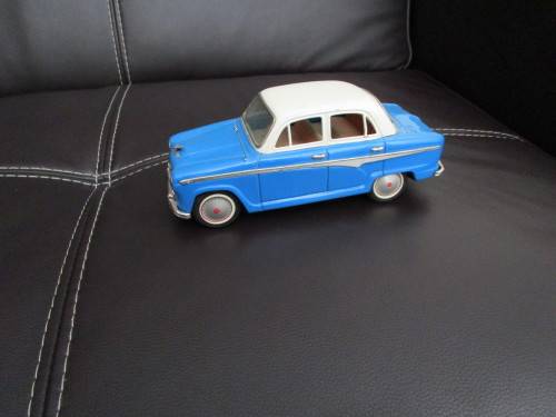 Two model cars - one Shuco Radio 4012 and one Austin model