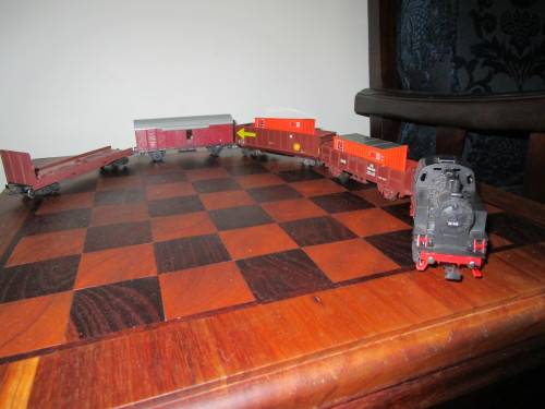 Nine LIMA model trains (two locomotives and seven cars sold as one package + 20 tracks)