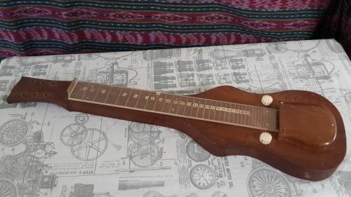 Weird vintage custom made guitar and case.