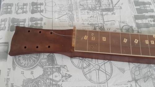 Weird vintage custom made guitar and case.