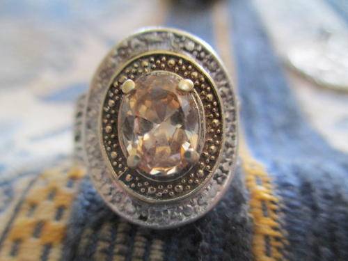 VINTAGE  9 CT GOLD AND STERLING SILVER  RING WITH BEAUTIFUL LARGE CENTER GEM.