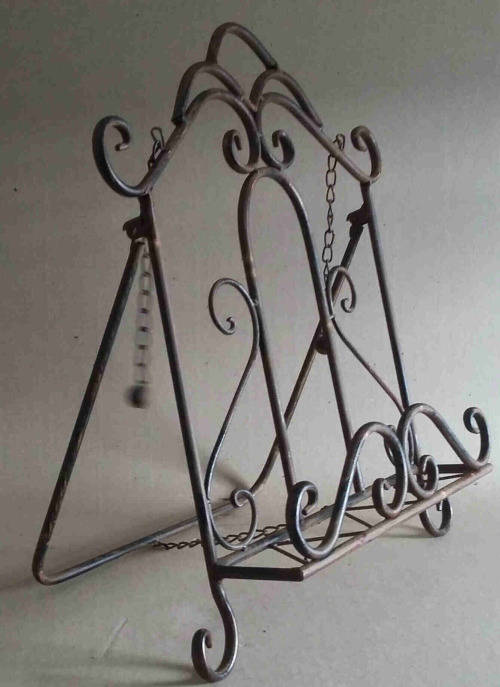 Wrought metal book stand.