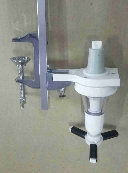 Single mounted  commercial optic spirit tot measure dispenser.