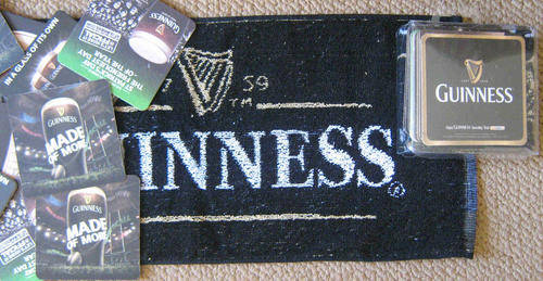 Guinness . Bar towel and 10 coasters