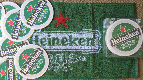 Heineken . Bar towel and 10 drink coasters