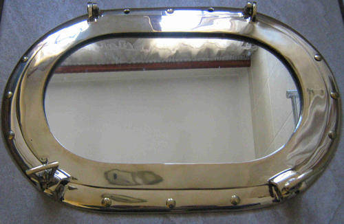 Porthole oval mirror, solid brass.                                                        nb6