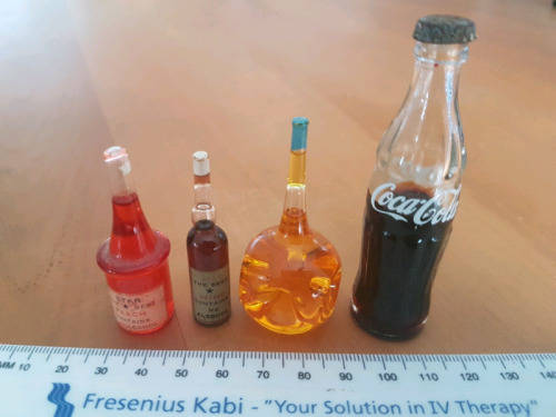 Collection of 4 Miniature Bottles Tallest 8cm