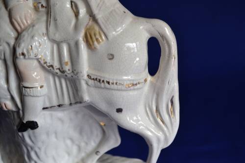 Pair of 19th Century Staffordshire  Scottish highlander Huntsmen on Horseback