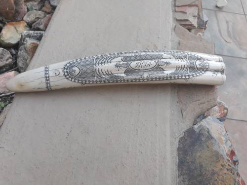 VERY INTERESTING UNUSUAL PIECE REPRODUCTION TYPE OF RESIN SCRIMSHAW TUSK. MARINER CONNECTION?