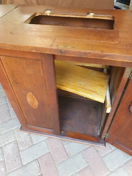 VINTAGE WOOD ETC SEWING CABINET WITH SOME FRONTAL RELIEF DETAIL