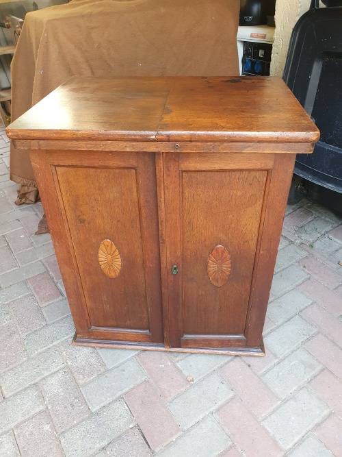 VINTAGE WOOD ETC SEWING CABINET WITH SOME FRONTAL RELIEF DETAIL
