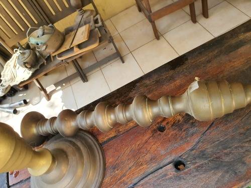 PAIR TALL BRASS CANDLE STICK HOLDERS WITH DETAIL COULD BE CONVERTED TO LAMP BASES?