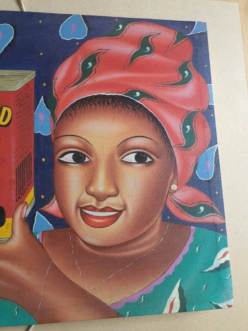 STUNNING VINTAGE SIGNED BLANCHARD `99 NAIVE AFRICAN WOMAN WITH BULL BRAND TIN CANVAS PAINTING
