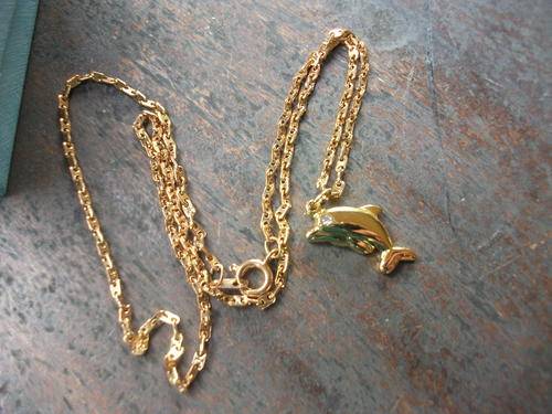 GOLD TONED NECKLACE WITH DOLPHIN PENDANT (FAUX DIAMOND EYE)