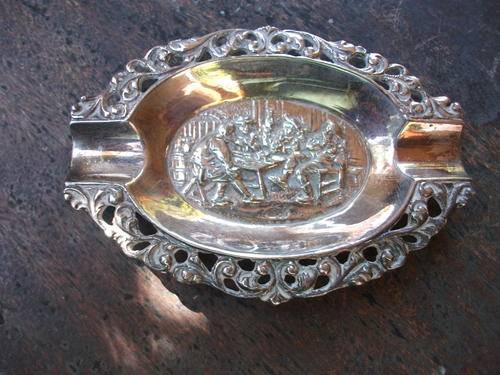 VERY SMALL BUT ORNATE SILVER PLATED ASHTRAY WITH SOCIAL & JOVIAL BAR SCENE DETAIL
