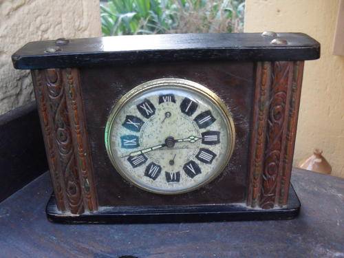SCHWARZWALD VINTAGE ALARM AND MANTLE CLOCK ENCASED IN WOOD?BROWN & BLACK & CREAM FACE NICE OLD LOOK