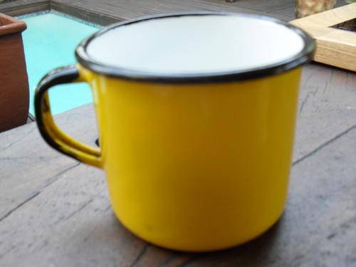 MADE IN POLAND VINTAGE???? BRIGHT YELLOW ENAMEL CUP....NICE!