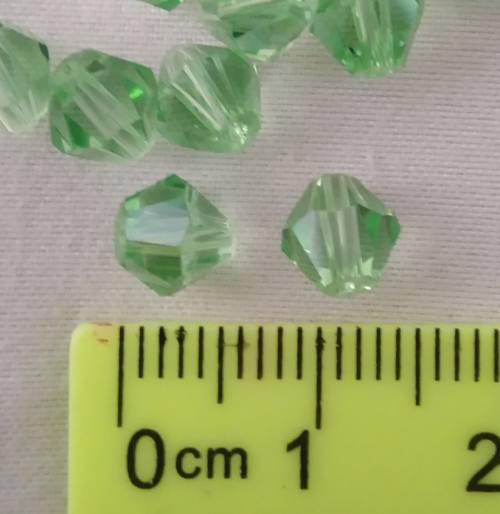 10 x Glass Bicone Beads, Light Green. 6mm x 5mm
