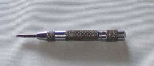Automatic centre punch
