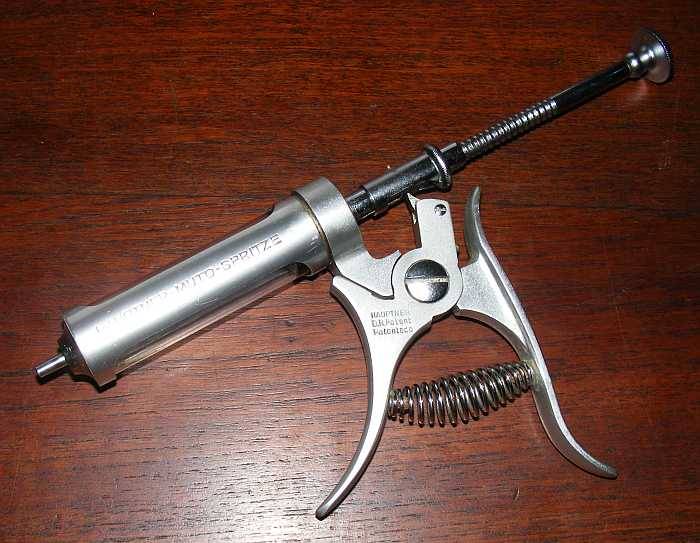 Syringe adjustable dosage