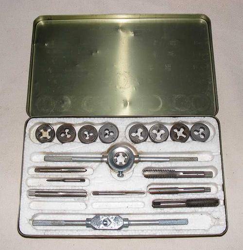 Set of Whitworth taps and dies in tin box