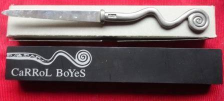 A boxed unused CaRRoL BoYeS letter opener