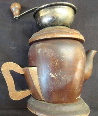 An unusual coffee grinder designed as a kettle.