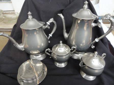 An electroplated tea and coffee set with coasters