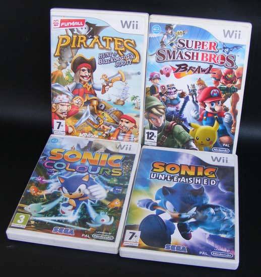 Lot of 4 Nintendo Wii games - Very good condition - Sonic, Pirates, Super smash bros.