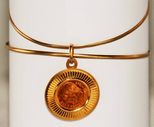 *GOLD*22 CT GOLD MEXICAN COIN SET IN AN 18CT GOLD SETTING ON TWO 9CT GOLD BANGLES - VALUE R12 500