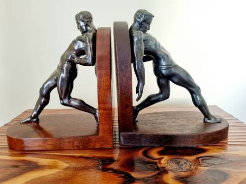 pair of Art Deco spelter bookends styled in R. Vramant, France  Circa 1930`s