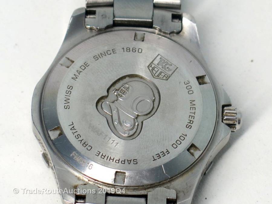 Tag Heuer Aquaracer Quartz Mens Wristwatch Model WAF1111 White Dial