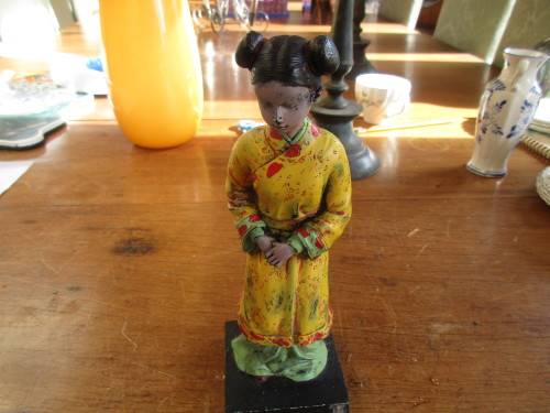 LOVELY ORIENTAL YOUNG LADY IN YELLOW OUTFIT