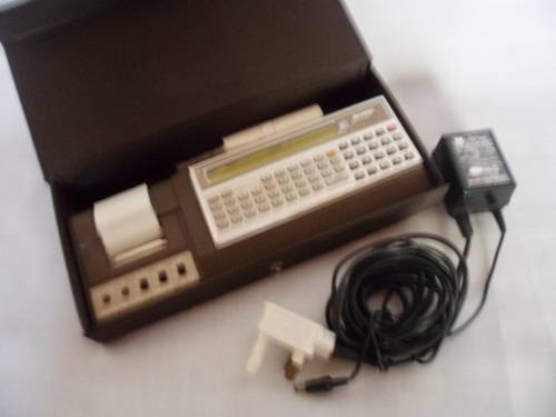Sharp PC-1211 Programmable Pocket Computer with CE-121 Printer, charger and all Manuals