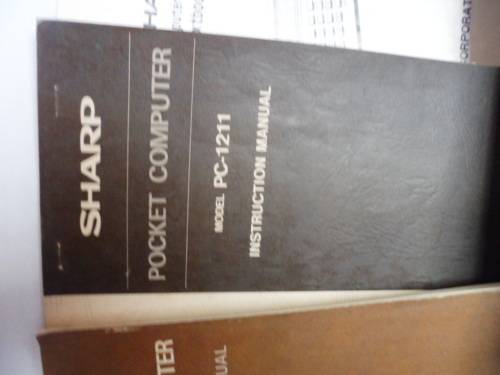 Sharp PC-1211 Programmable Pocket Computer with CE-121 Printer, charger and all Manuals