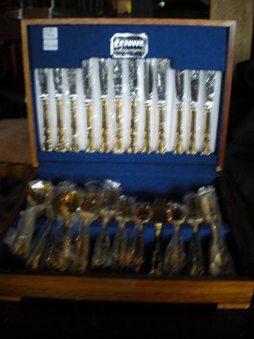 UNUSED GOLD PLATED CUTLERY SET