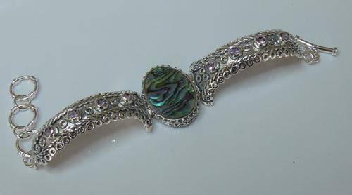 Sterling silver plated bracelet with paua shell centre piece