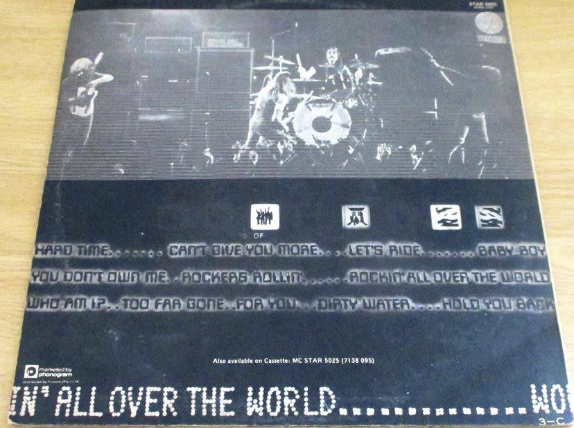 STATUS QUO  Rockin` All Over The World Rhodesian LP VINYL RECORD [Shelf G]