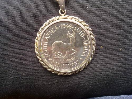 Vintage sterling silver pendant on a chain with a very large silver 1948 SA 5 shillings. Chain= 66cm