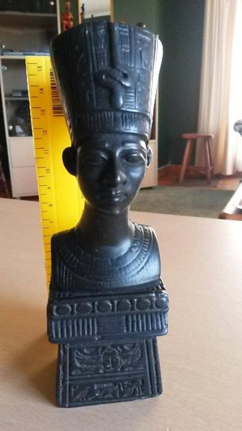 Very attractive and heavy Egyptian Farroah art. 16cm high. Very heavy- 600gm. Feels like a stone.