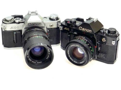 Canon A-1 and Canon AE-1 with Canon Lenses****Cosmetically Excellent****